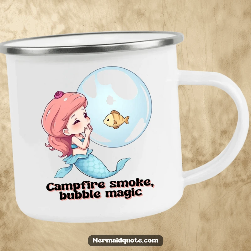 Funny camping mug depicting a mermaid blowing a bubble with a tiny fish inside, ideal for enjoying drinks in nature.