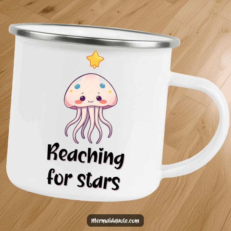 Funny jellyfish camping mug showing a curious character reaching for a floating star, perfect for enjoying drinks outdoors.
