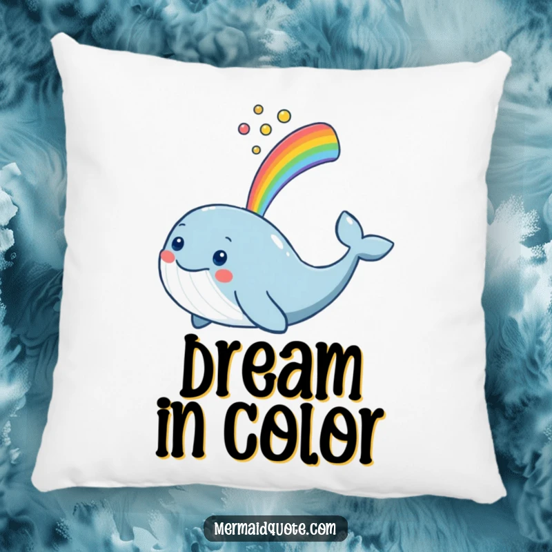 Funny smiling whale spouting a rainbow, featured on a plush pillow for decorative comfort and cheer.