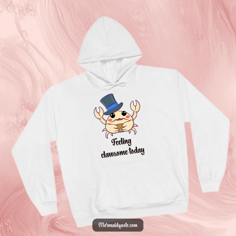 Funny crab wearing a distinguished top hat, holding a minuscule treasure, printed on a warm hoodie for ultimate comfort.