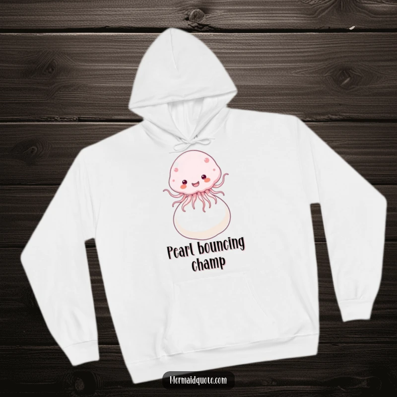 Funny Hoodie featuring a fluffy jellyfish joyfully bouncing on a giant pearl, offering cozy comfort and sea-themed fun.