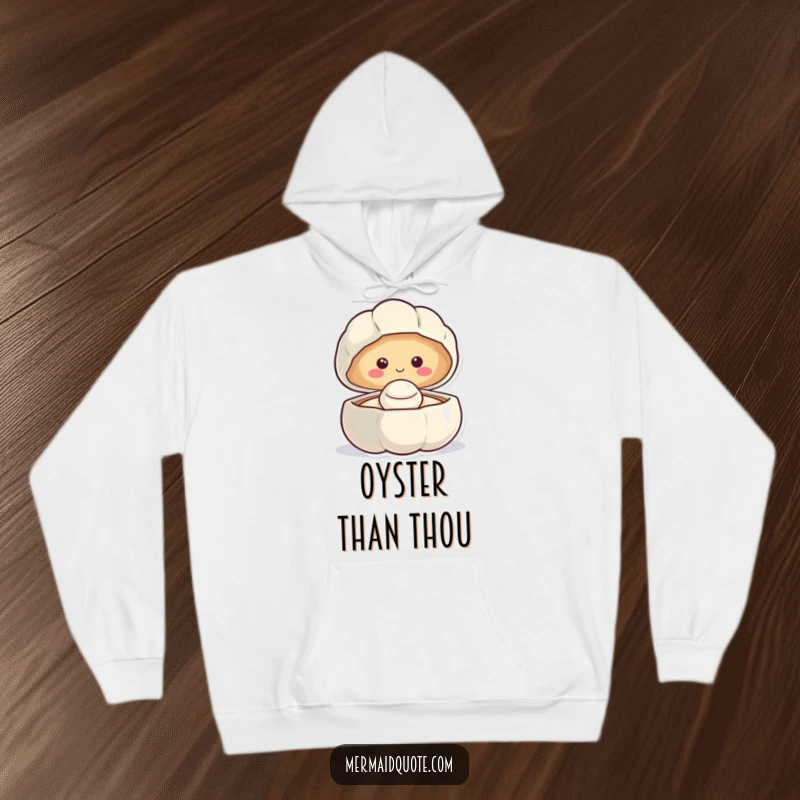 Funny smiling clam hoodie revealing a happy pearl, offering comfort and a cheerful ocean-themed design.