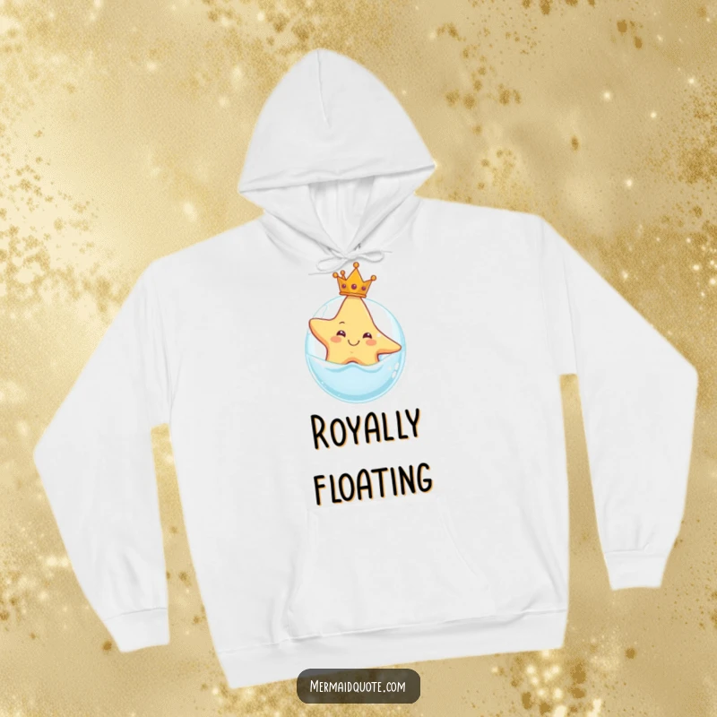 Funny hoodie with a smiling starfish wearing a crown, floating on a bubble, offering cozy comfort and a touch of marine whimsy.