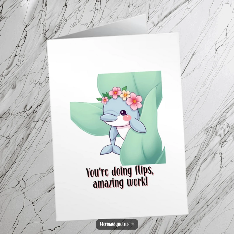 Free printable congratulations card: A curious dolphin crowned with flowers peeks from kelp, conveying heartfelt congrats with ocean charm.