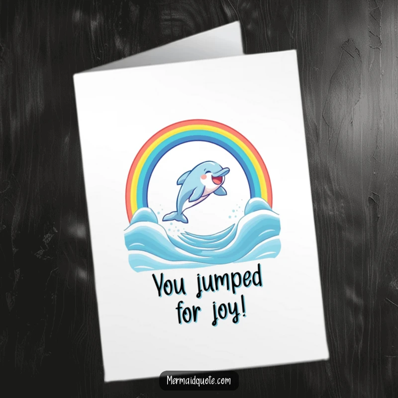 Funny Free Printable Dolphin Congratulations Card: A happy dolphin jumps through a rainbow, celebrating your amazing news.