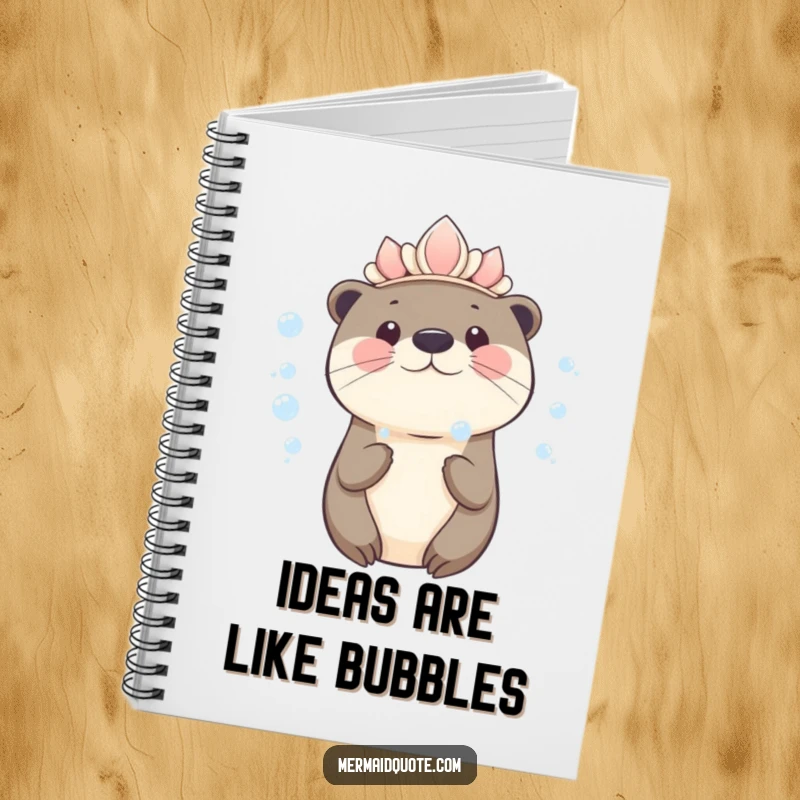Funny kawaii otter wearing a seashell crown blowing bubbles on a notebook, perfect for jotting down cute or funny thoughts.