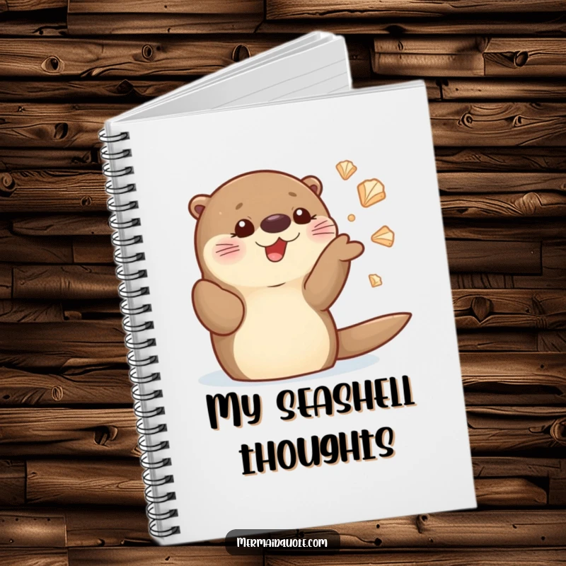 Funny sea otter notebook with a cute character juggling shiny seashells on the cover, ideal for writing and drawing.