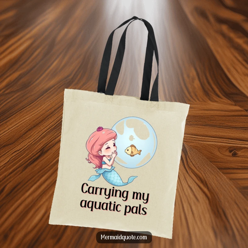 Funny tote bag illustrated with a mermaid blowing a bubble containing a tiny fish, a cute design for everyday use.