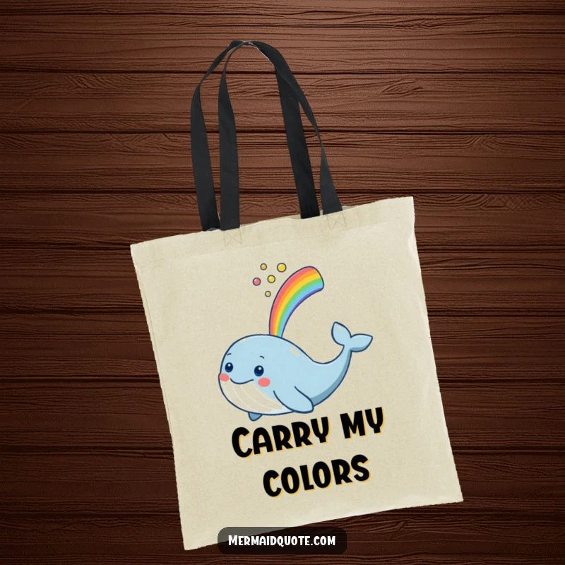 Funny smiling whale spouting a rainbow on a durable tote bag, perfect for carrying daily essentials with cheer.
